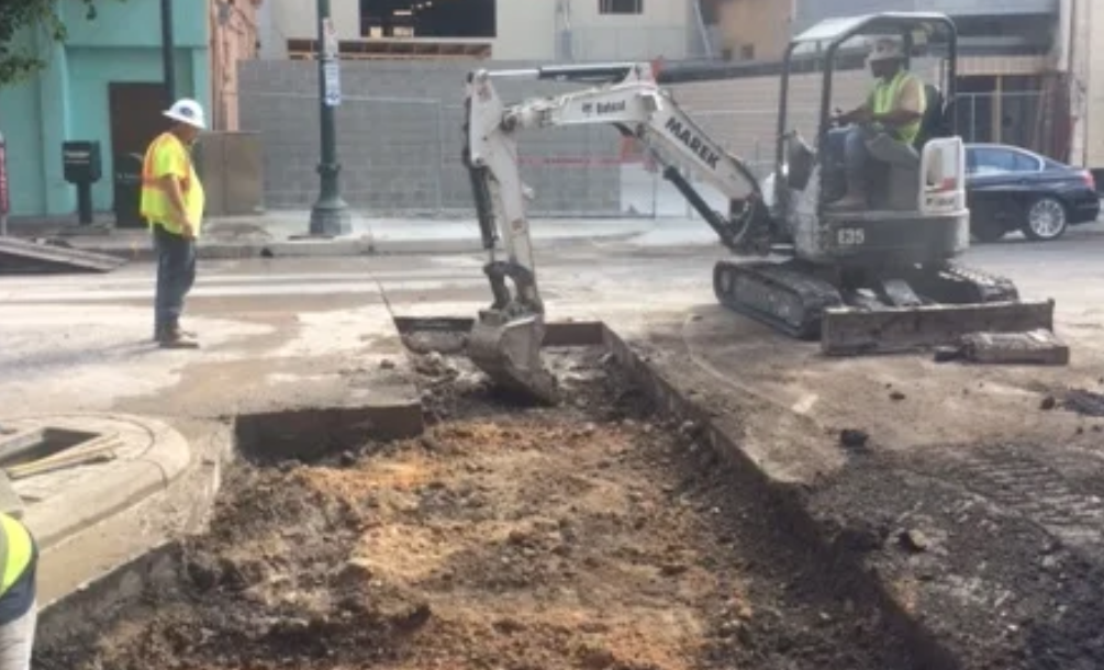 Hydraulic concrete breaker removing reinforced slab (1)